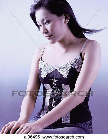 Woman sitting, portrait View Large Photo Image Stock Photograph - Woman sitting, portrait. Fotosearch
