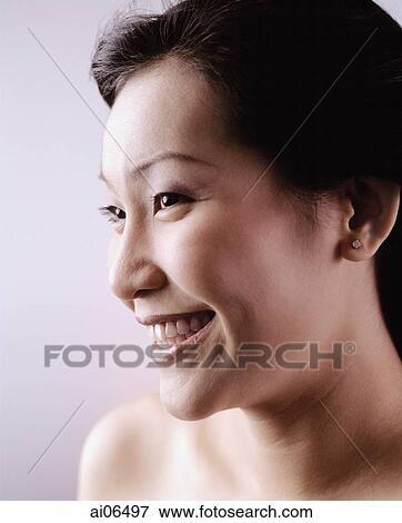 Woman smiling, portrait View Large Photo Image Stock Photo - Woman smiling, portrait. Fotosearch