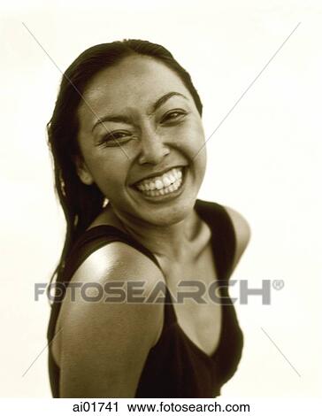 Stock Image - Woman smiling, portrait, white background. Fotosearch