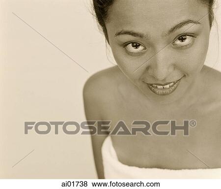 Woman wrapped in towel, portrait View Large Photo Image Stock Photo - Woman wrapped in towel, portrait. Fotosearch