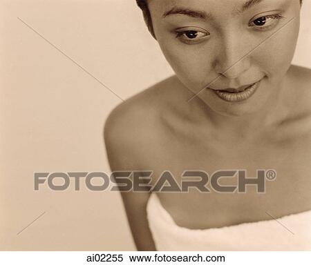 Woman wrapped in towel View Large Photo Image Stock Photography - Woman wrapped in towel. Fotosearch