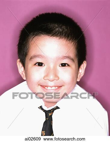 Young boy dressed in tie and shirt, smiling, portrait, purple background. View Large Photo Image Stock Photo - Young boy dressed in tie and shirt, smiling, portrait, purple background.. Fotosearch