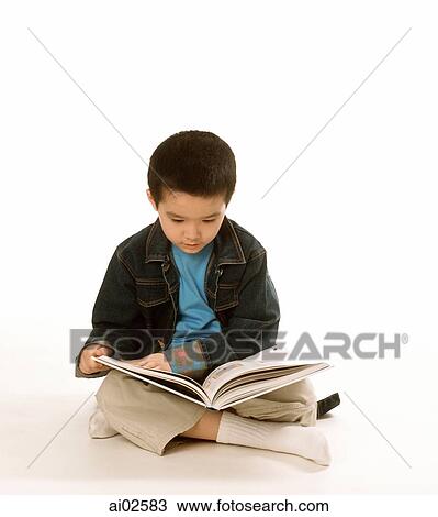 Young boy reading book, white background. View Large Photo Image Stock Image - Young boy reading book, white background.. Fotosearch