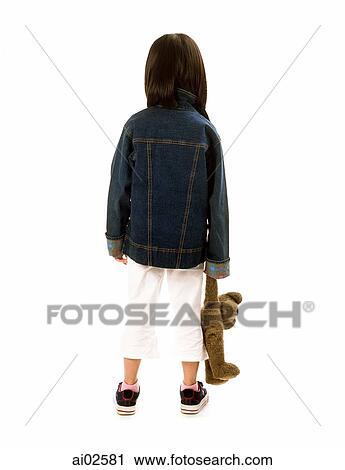 Young girl holding teddy bear, back view, white background. View Large Photo Image Stock Image - Young girl holding teddy bear, back view, white background.. Fotosearch