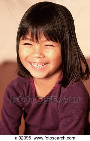 Young girl laughing, portrait View Large Photo Image Stock Photograph - Young girl laughing, portrait. Fotosearch