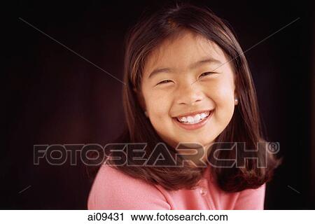 Young girl smiling, portrait View Large Photo Image Stock Image - Young girl smiling, portrait. Fotosearch