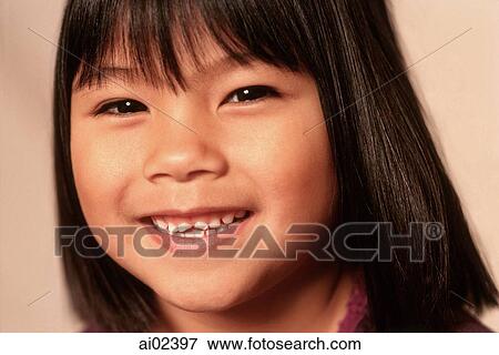 Young girl smiling, portrait View Large Photo Image Stock Photo - Young girl smiling, portrait. Fotosearch