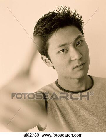 Young man gesturing. View Large Photo Image Stock Photo - Young man gesturing.. Fotosearch