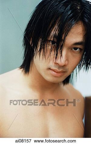 Young man looking at camera View Large Photo Image Stock Photo - Young man looking at camera. Fotosearch