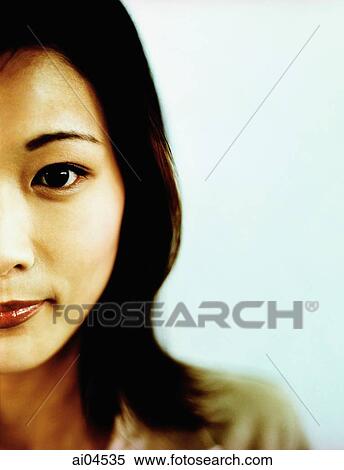 Young woman, half of face shown, portrait. View Large Photo Image Stock Photography - Young woman, half of face shown, portrait.. Fotosearch