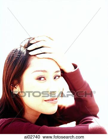 Stock Image - Young woman, portrait.. Fotosearch