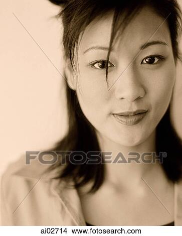 Young woman, portrait, white background. View Large Photo Image Picture - Young woman, portrait, white background.. Fotosearch