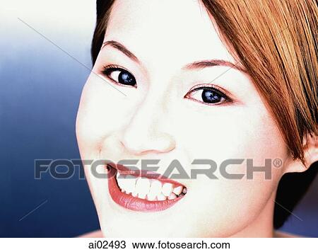 Young woman smiling, portrait View Large Photo Image Stock Image - Young woman smiling, portrait. Fotosearch
