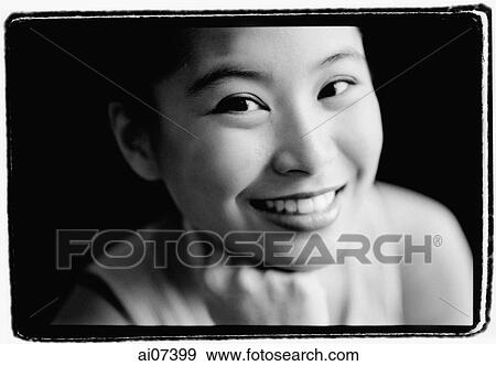Young woman with hand on chin, smiling. View Large Photo Image Stock Photo - Young woman with hand on chin, smiling.. Fotosearch