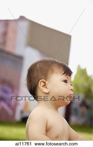 Baby girl, looking away View Large Photo Image Stock Image - Baby girl, looking away. Fotosearch