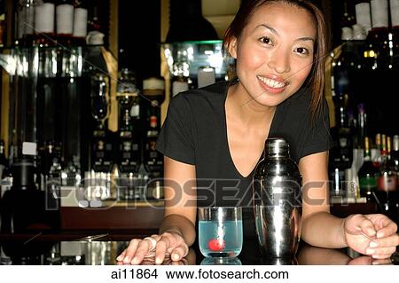Bartender leaning on counter, looking at camera View Large Photo Image Picture - Bartender leaning on counter, looking at camera. Fotosearch