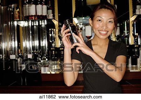 Bartender with cocktail mixer View Large Photo Image Stock Image - Bartender with cocktail mixer. Fotosearch