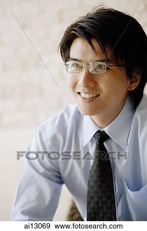 Businessman looking away, portrait View Large Photo Image Stock Photo - Businessman looking away, portrait. Fotosearch