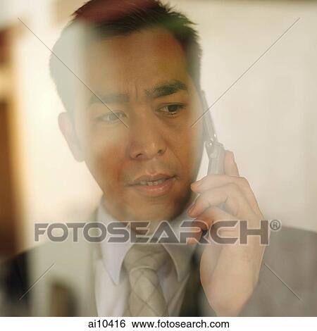 Businessman on mobile phone View Large Photo Image Stock Photograph - Businessman on mobile phone. Fotosearch