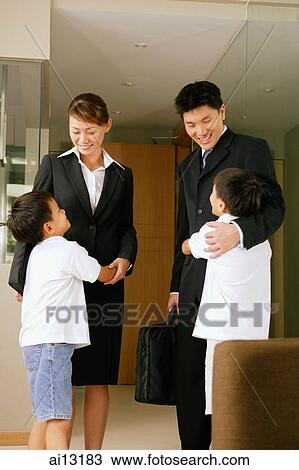 Children hugging mother and father View Large Photo Image Stock Image - Children hugging mother and father. Fotosearch