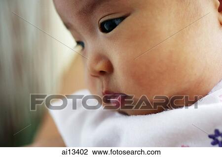 Close-up of baby girl View Large Photo Image Stock Image - Close-up of baby girl. Fotosearch