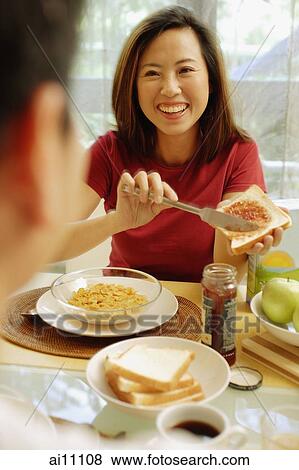 Couple having breakfast. View Large Photo Image Stock Photo - Couple having breakfast.. Fotosearch