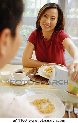Couple having breakfast. View Large Photo Image Stock Photograph - Couple having breakfast.. Fotosearch