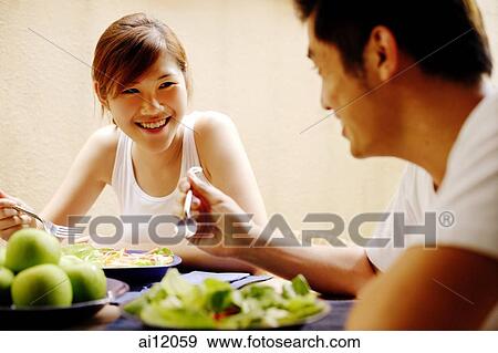 Stock Photo - Couple having lunch. Fotosearch