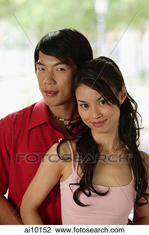 Couple looking at camera View Large Photo Image Stock Image - Couple looking at camera. Fotosearch