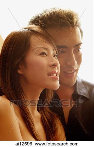 Couple side by side, head shot View Large Photo Image Stock Photograph - Couple side by side, head shot. Fotosearch