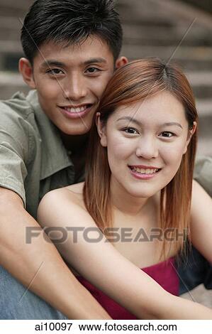 Couple smiling, looking at camera. View Large Photo Image Stock Photo - Couple smiling, looking at camera.. Fotosearch
