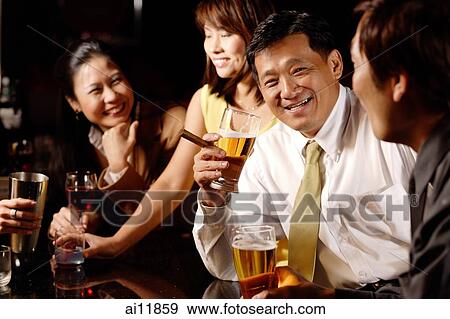 Couples at bar, drinking View Large Photo Image Stock Photo - Couples at bar, drinking. Fotosearch