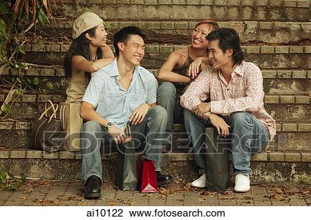 Couples sitting together on steps View Large Photo Image Stock Image - Couples sitting together on steps. Fotosearch
