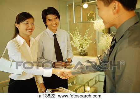 Executives shaking hands View Large Photo Image Stock Image - Executives shaking hands. Fotosearch