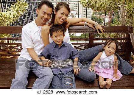 Family portrait, outdoors, high angle view View Large Photo Image Stock Photo - Family portrait, outdoors, high angle view. Fotosearch