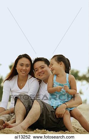 Family with one child, portrait View Large Photo Image Stock Image - Family with one child, portrait. Fotosearch