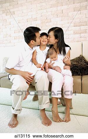 Stock Photography - Family with two children. Fotosearch