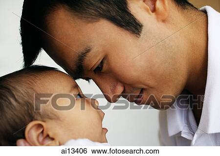 Father bonding with baby daughter View Large Photo Image Stock Photograph - Father bonding with baby daughter. Fotosearch