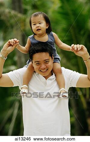 Father carrying daughter View Large Photo Image Stock Photograph - Father carrying daughter. Fotosearch