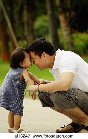Father face to face with young daughter View Large Photo Image Stock Photo - Father face to face with young daughter. Fotosearch