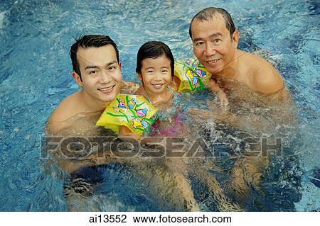 Father, grandfather and young girl in a swimming pool, looking at camera View Large Photo Image Stock Image - Father, grandfather and young girl in a swimming pool, looking at camera. Fotosearch