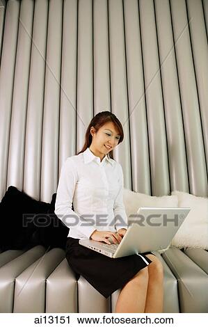 Female executive using laptop View Large Photo Image Stock Image - Female executive using laptop. Fotosearch