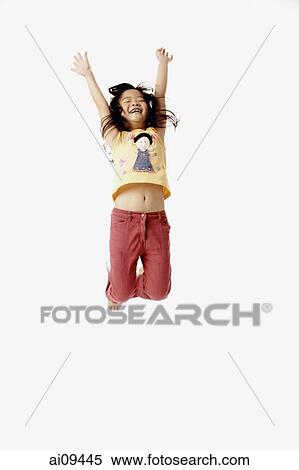 Girl jumping in the air with outstretched arms. View Large Photo Image Stock Photography - Girl jumping in the air with outstretched arms.. Fotosearch