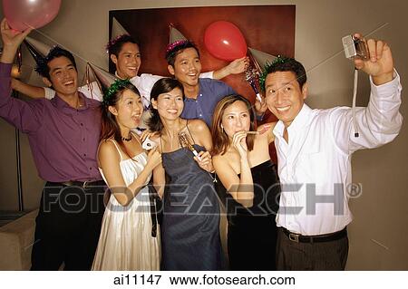 Group of friends posing for a picture View Large Photo Image Stock Photo - Group of friends posing for a picture. Fotosearch