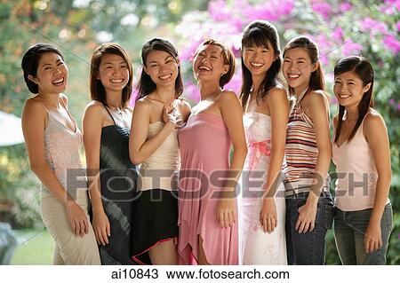Group of young women, smiling for camera View Large Photo Image Stock Image - Group of young women, smiling for camera. Fotosearch