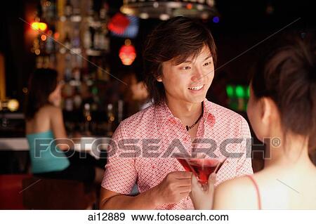 Man facing woman, over the shoulder view View Large Photo Image Stock Photo - Man facing woman, over the shoulder view. Fotosearch