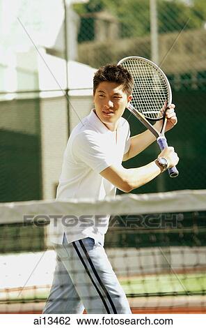 Man playing tennis View Large Photo Image Stock Image - Man playing tennis. Fotosearch