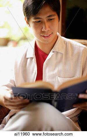 Man reading a book, portrait View Large Photo Image Stock Image - Man reading a book, portrait. Fotosearch
