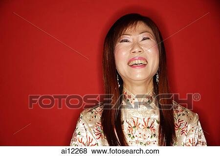 Mature woman in cheongsam, laughing View Large Photo Image Stock Photo - Mature woman in cheongsam, laughing. Fotosearch