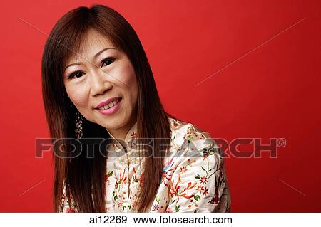 Mature woman in cheongsam, portrait View Large Photo Image Stock Photo - Mature woman in cheongsam, portrait. Fotosearch